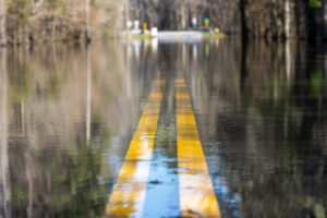Flood damage disrupts trucking, limits internet and cell service