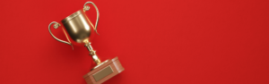 Award cup/trophy on a red background