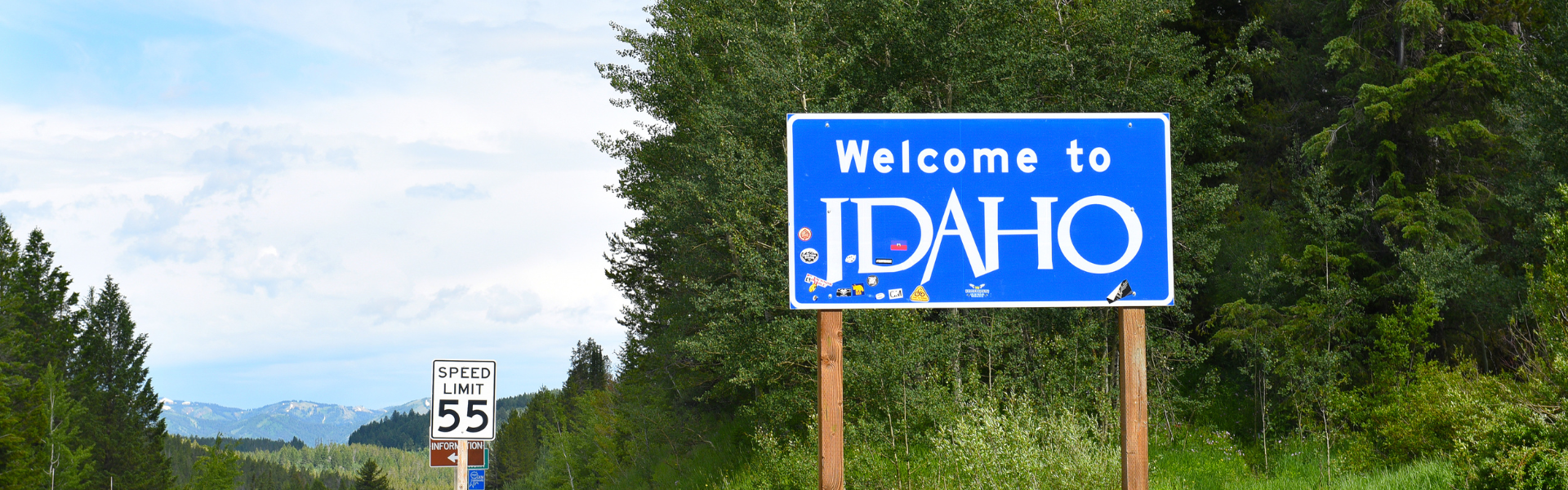 Welcome to Idaho sign on the side of the road