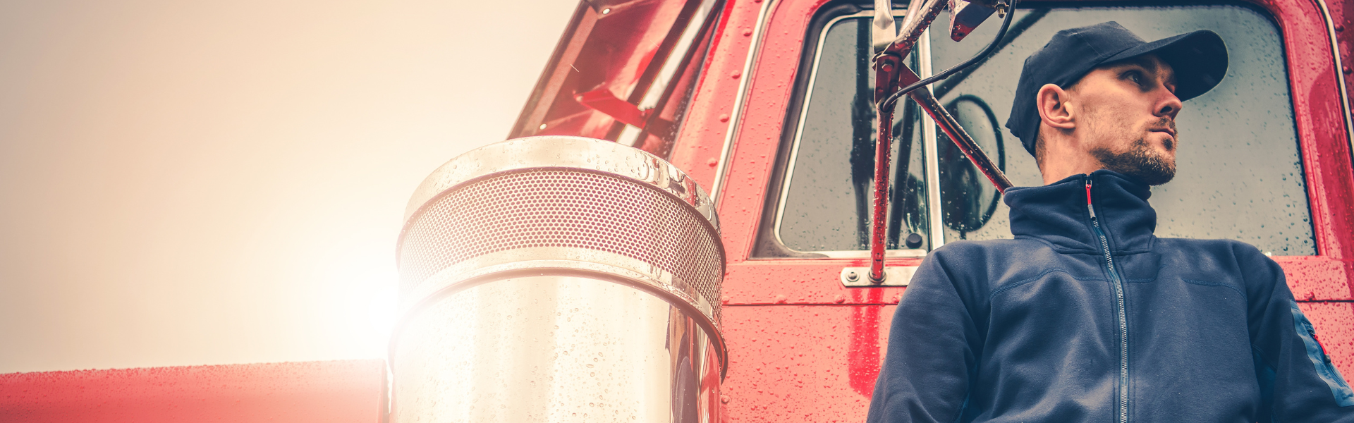Man standing in front of semi truck