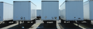 line of parked semi trailers