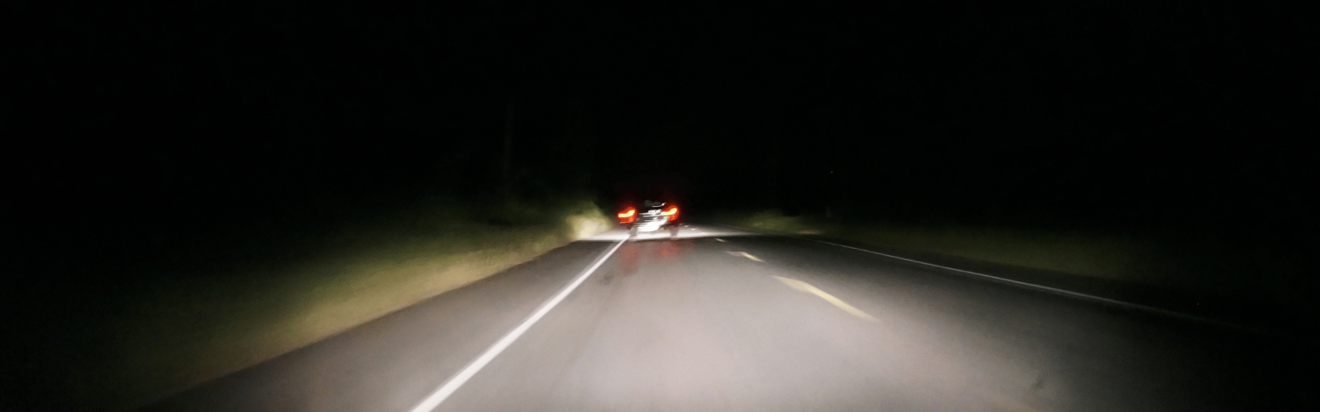 Dark highway at night