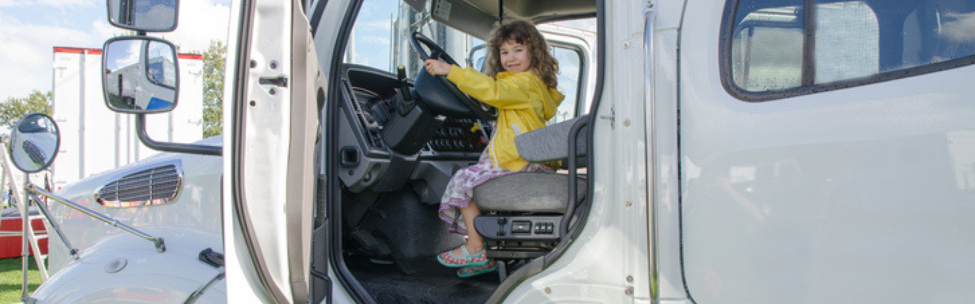 little girl in semi truck