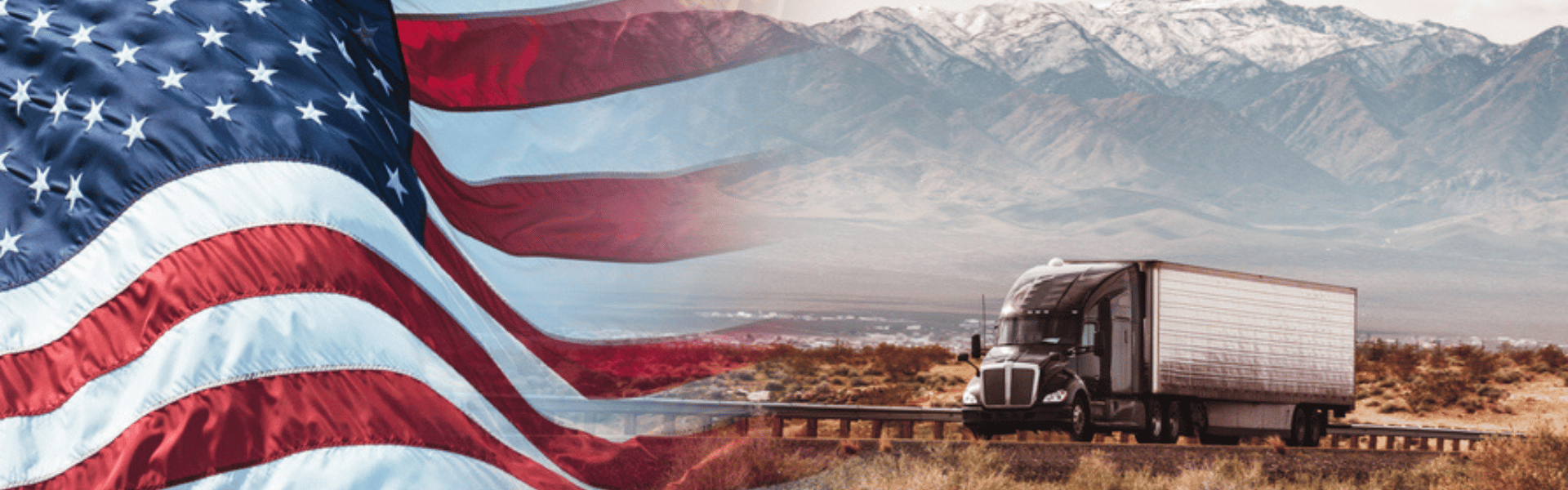 semi truck with american flag and mountains in the background