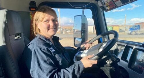 Woman driving semi truck