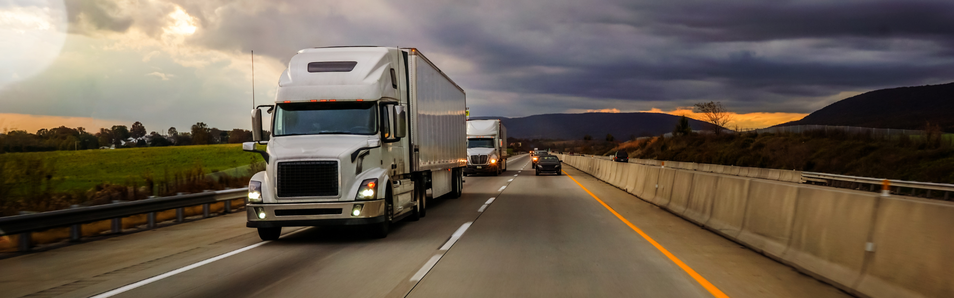 semi trucks on divided highway