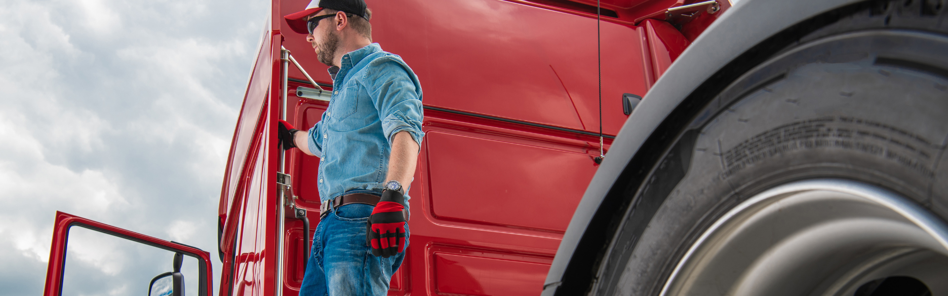 Man standing on semi truck