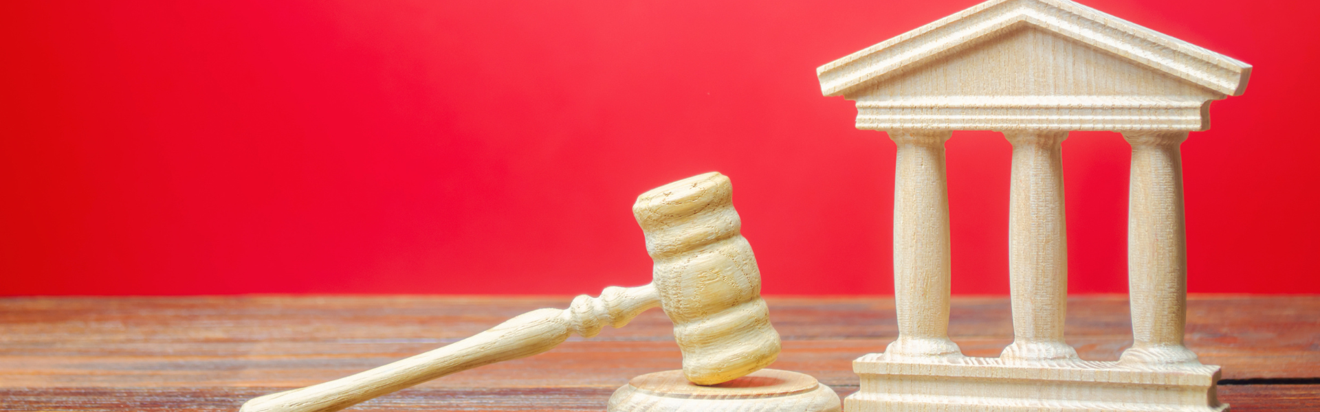 gavel on red background