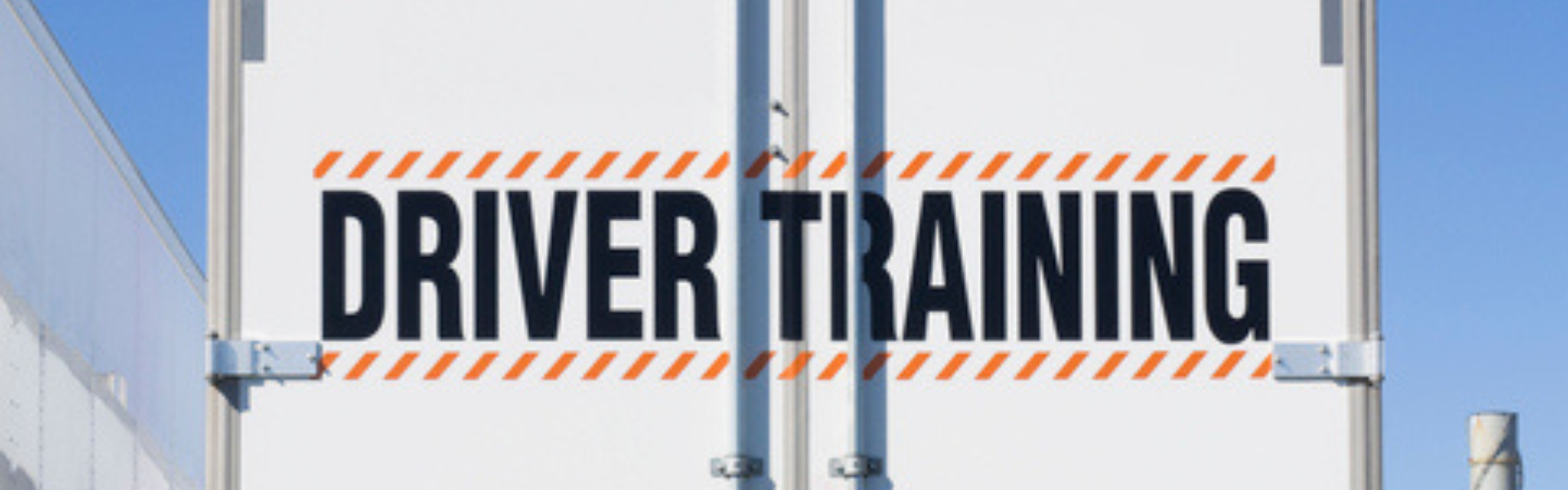 semi truck with driver training printed on the back