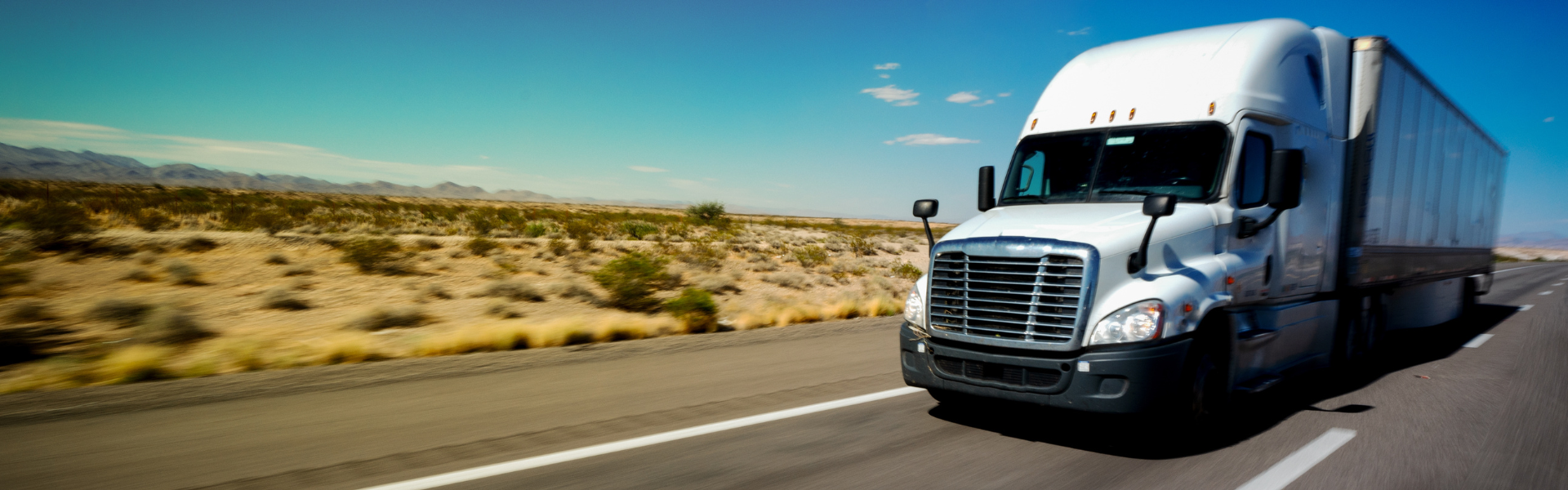 semi truck on desert road