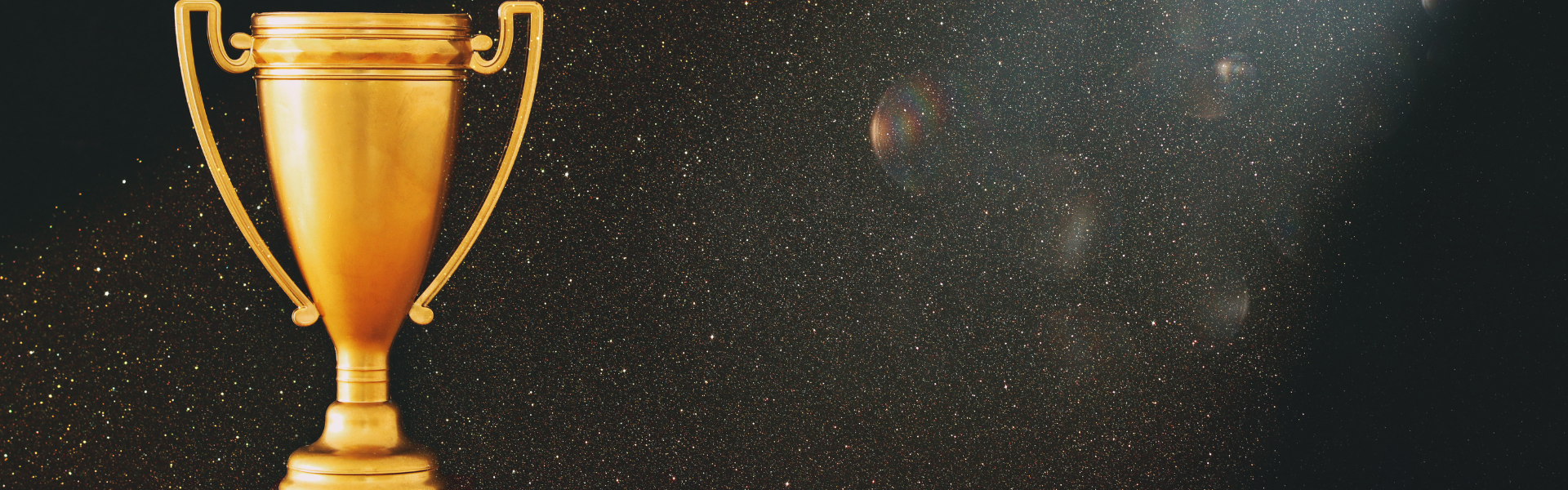 Trophy award on simple black background