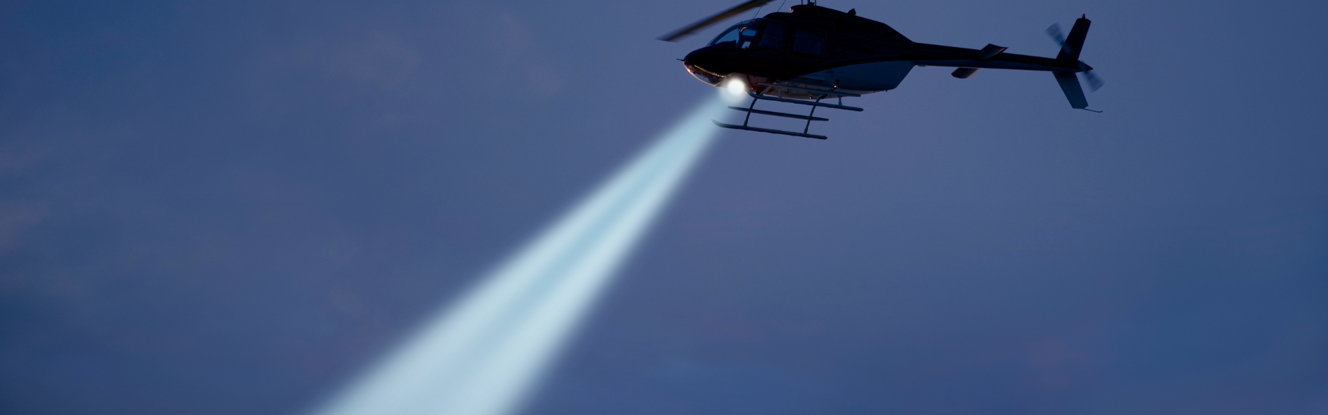 police helicopter with search light