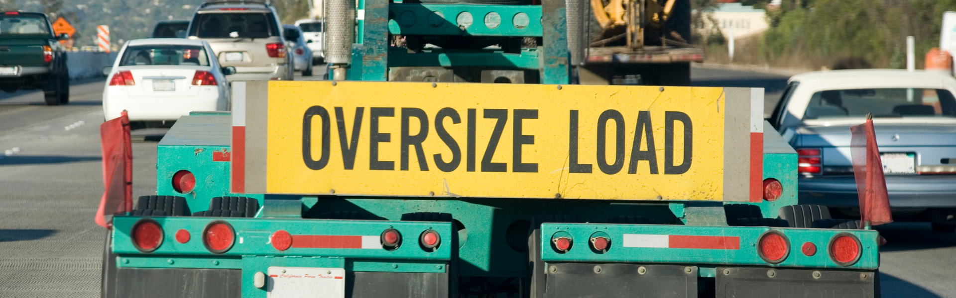 semi truck with oversize load banner