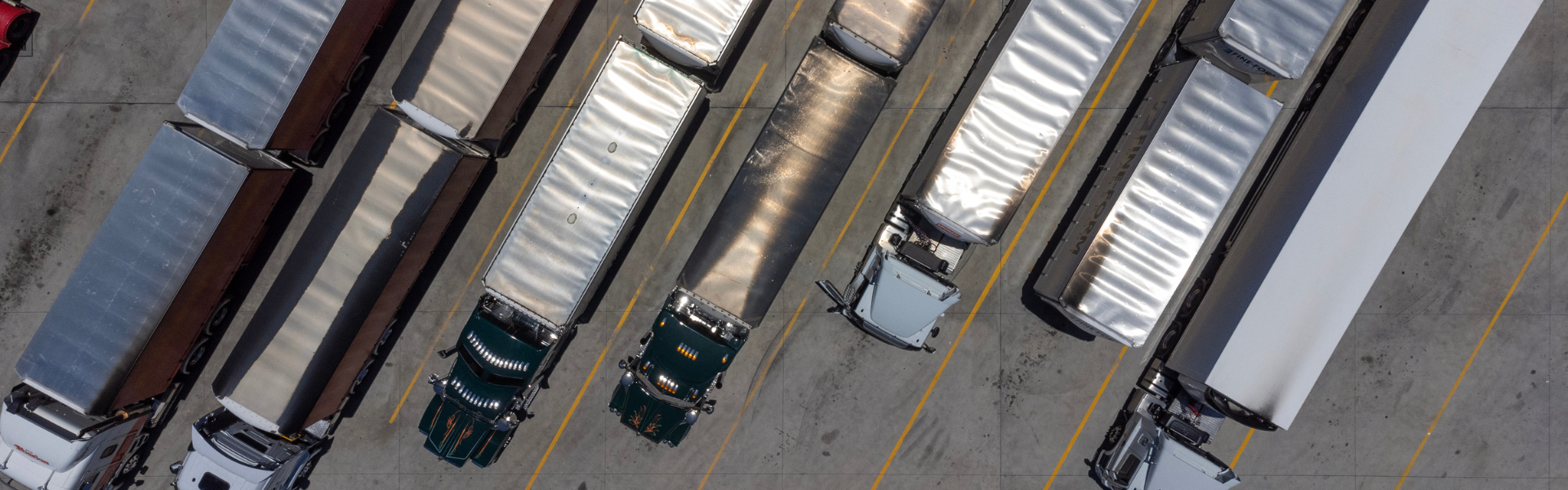 aerial view of parked semi trucks