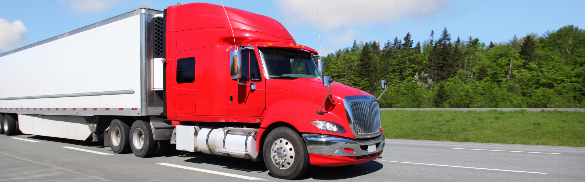 red semi truck on road