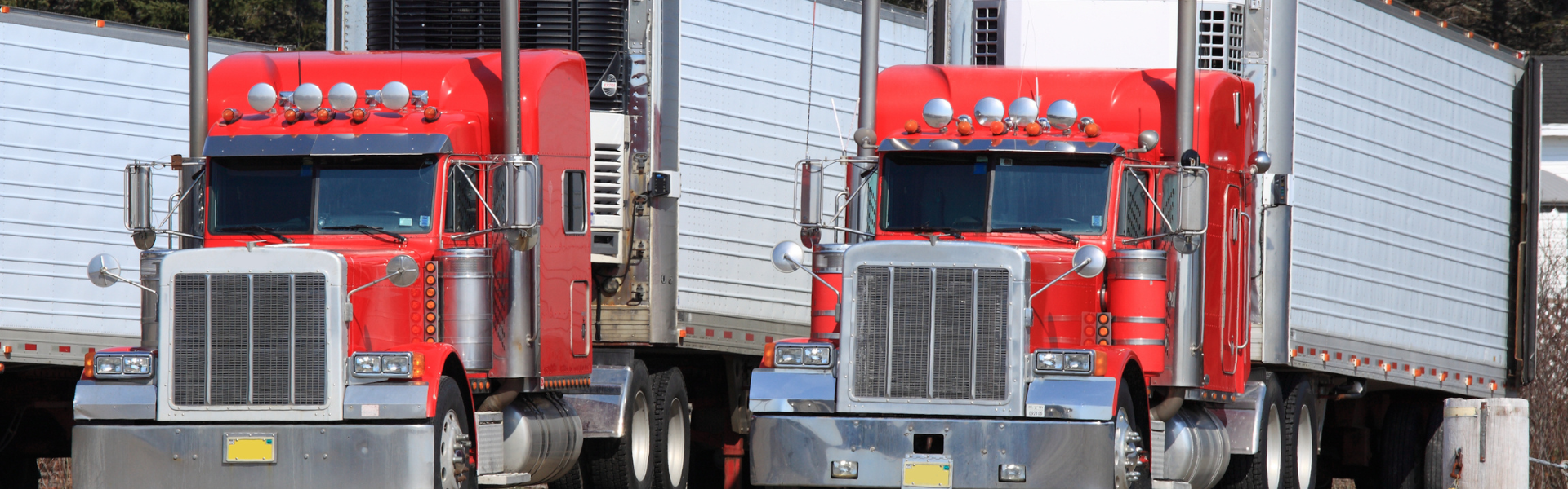 red semi trucks parked