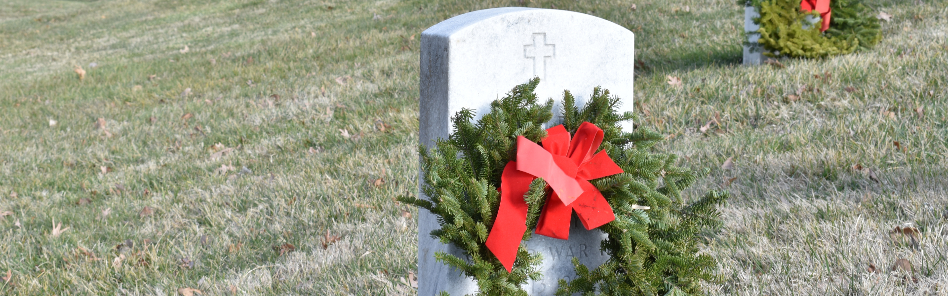 wreaths on gravestones