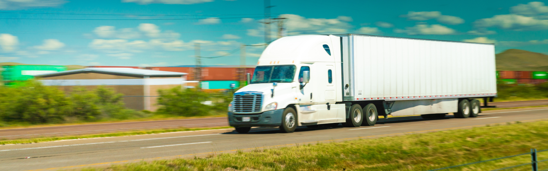 white semi truck on road