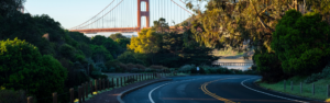 california highway with golden gate bridge in background