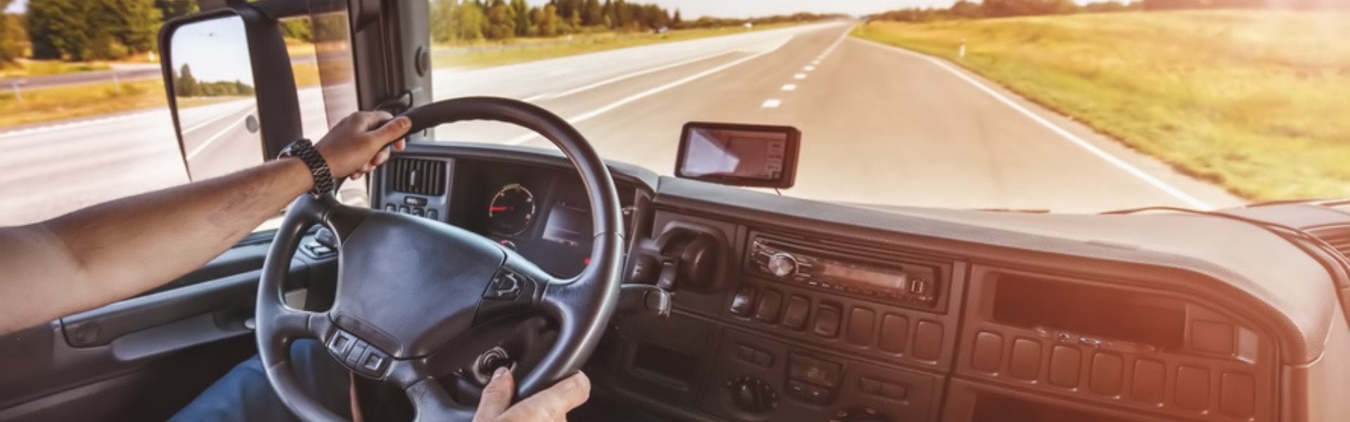 inside of semi truck while driving on road