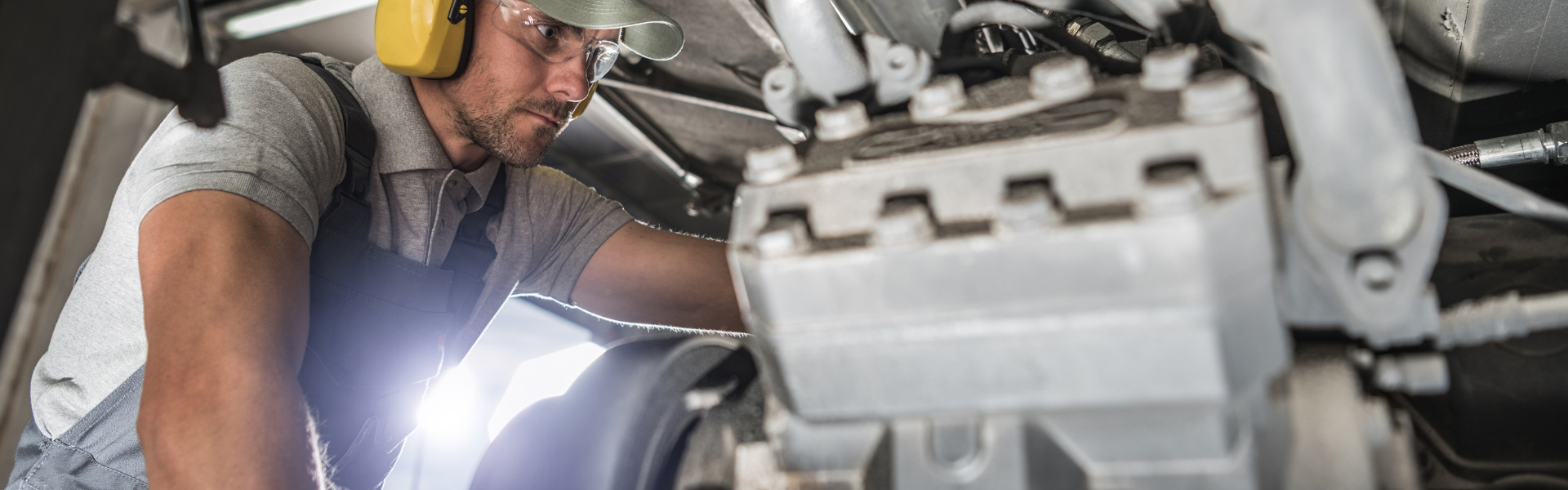 Diesel Technician working on diesel engine