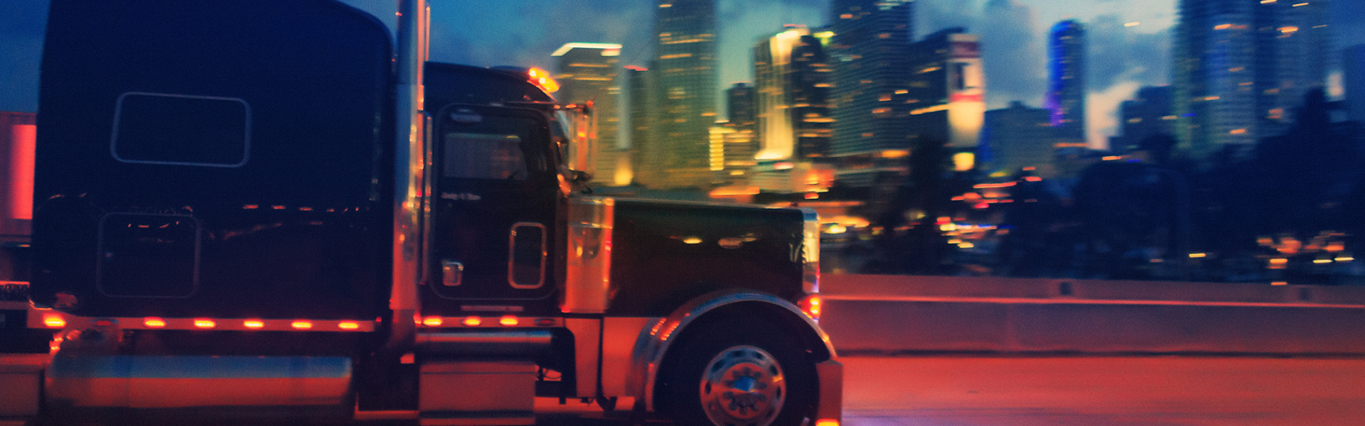 semi truck driving at night