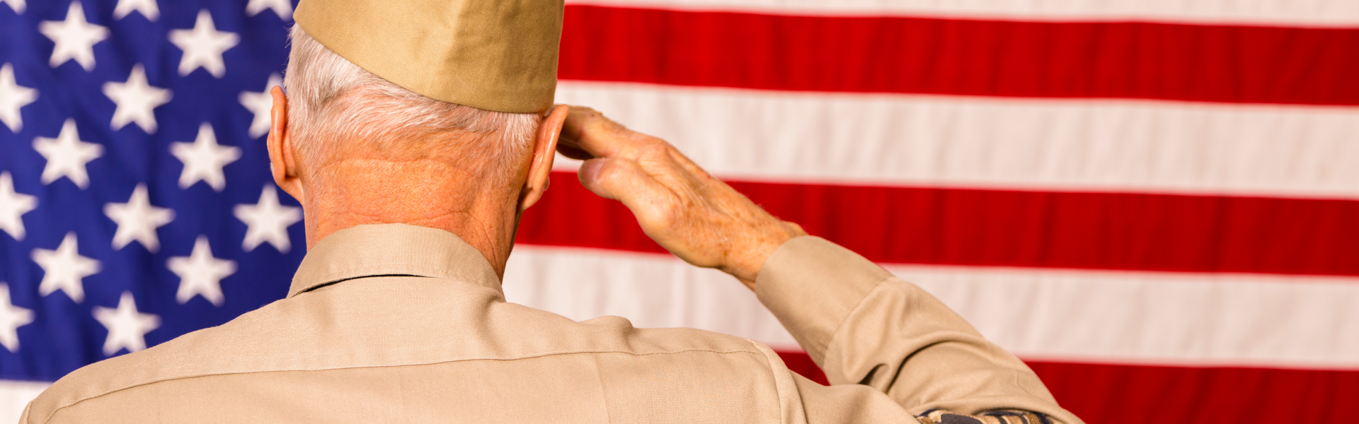 veteran saluting american flag