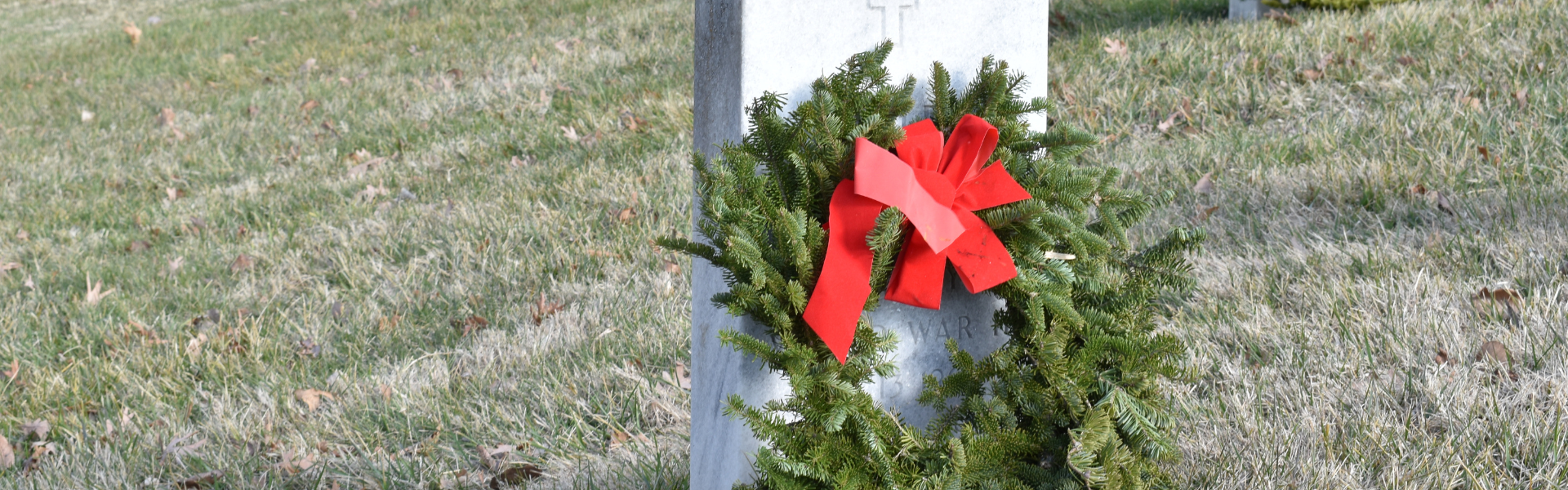 wreath on grave stone