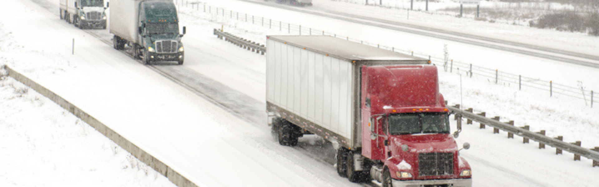 Semi trucks on snowy highway