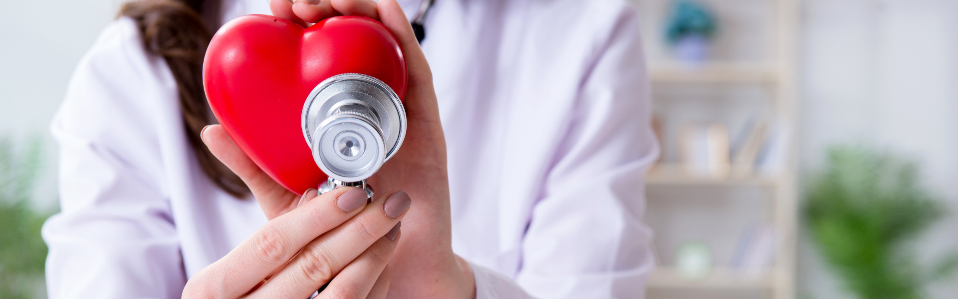 stethoscope on plastic heart