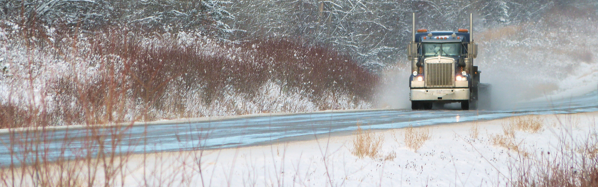 semi truck on snowy road