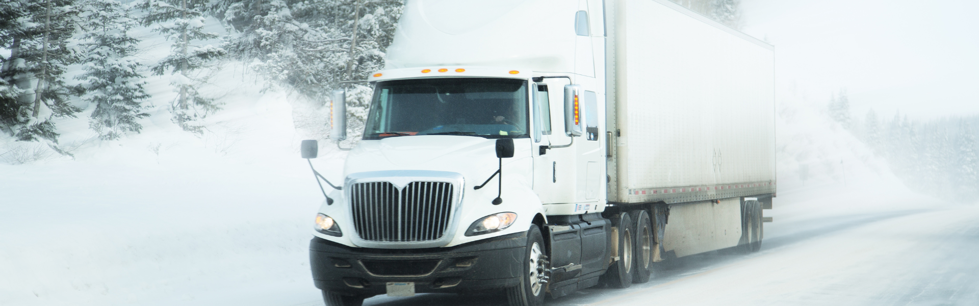 white semi truck in snow