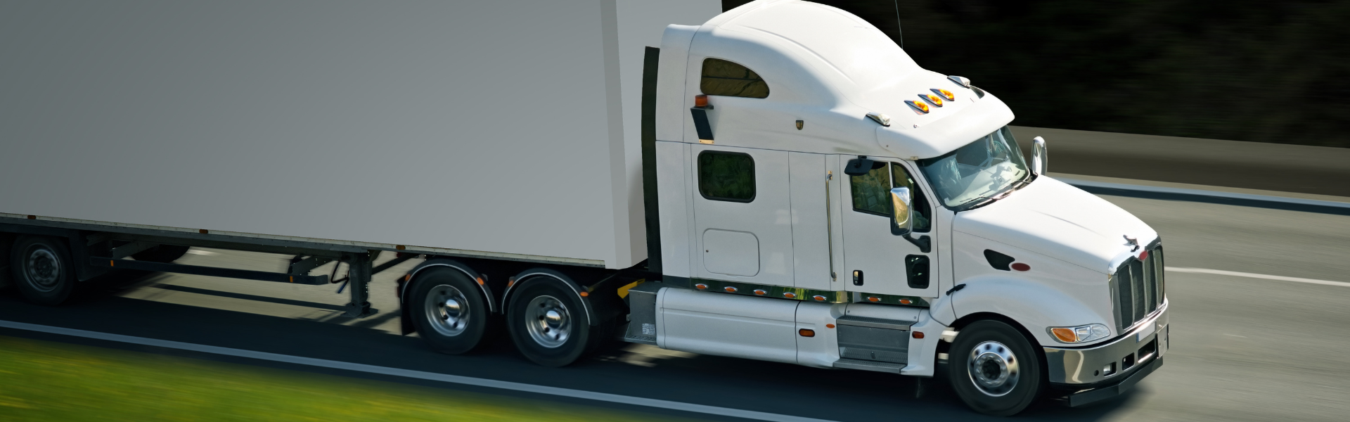 white semi truck on road