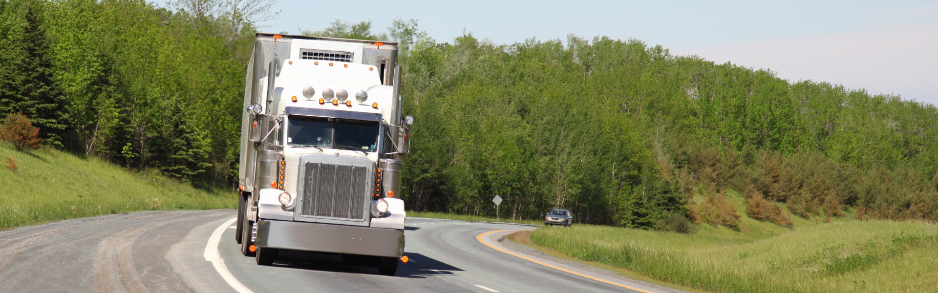 semi truck on curve in road