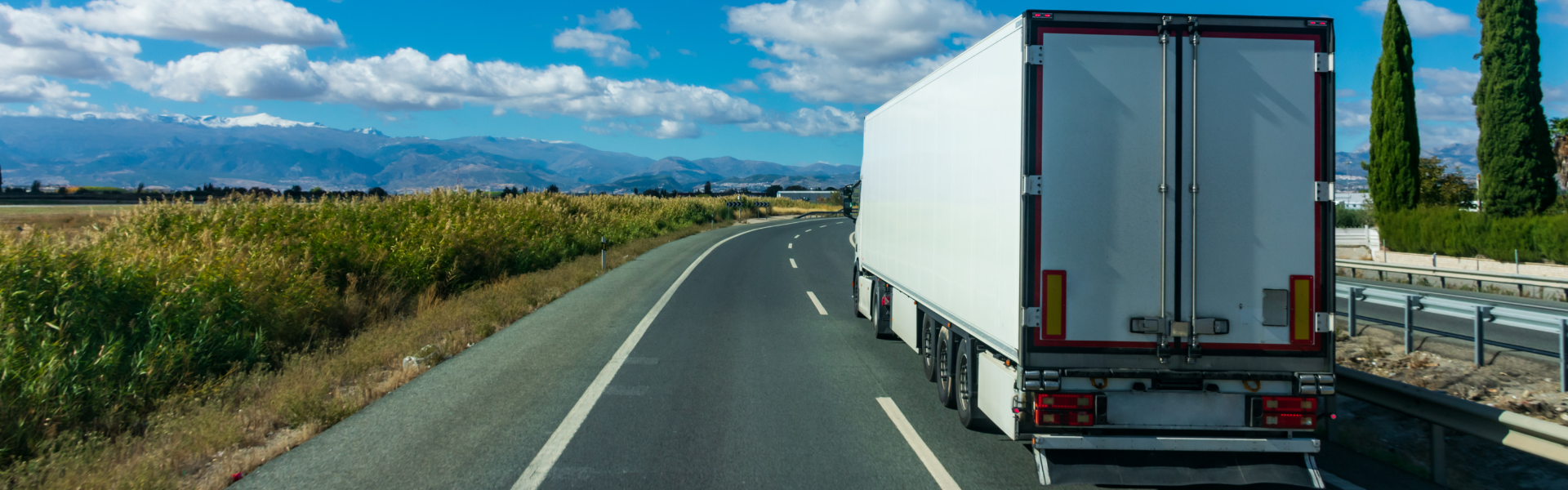 semi truck driving on road