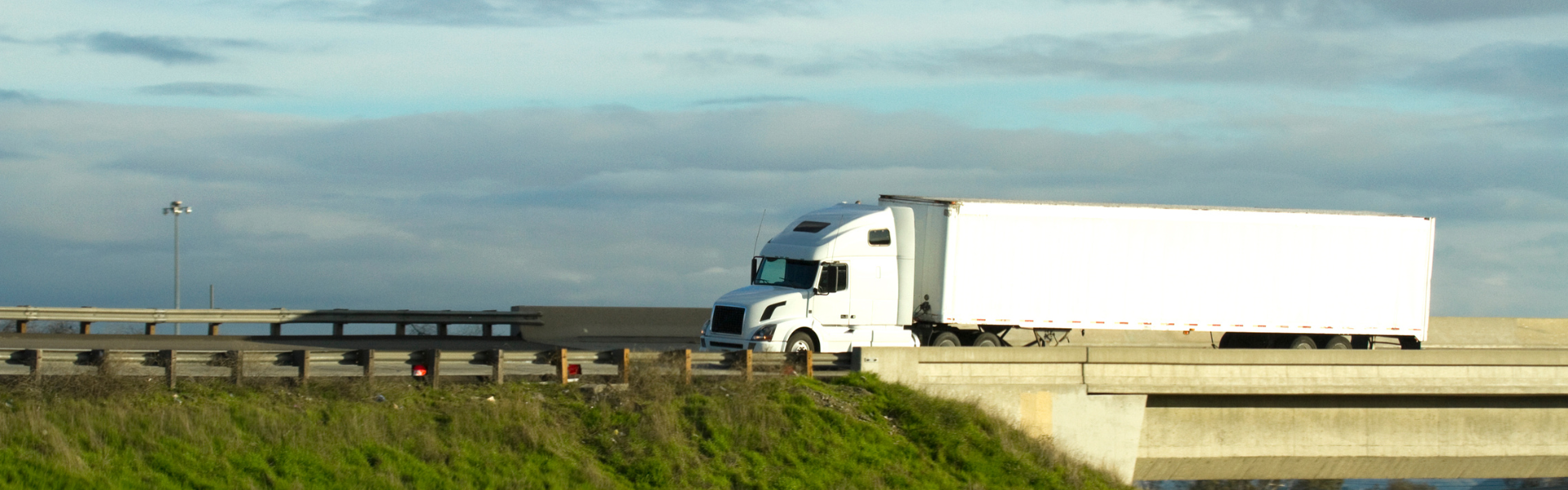 white semi truck on road