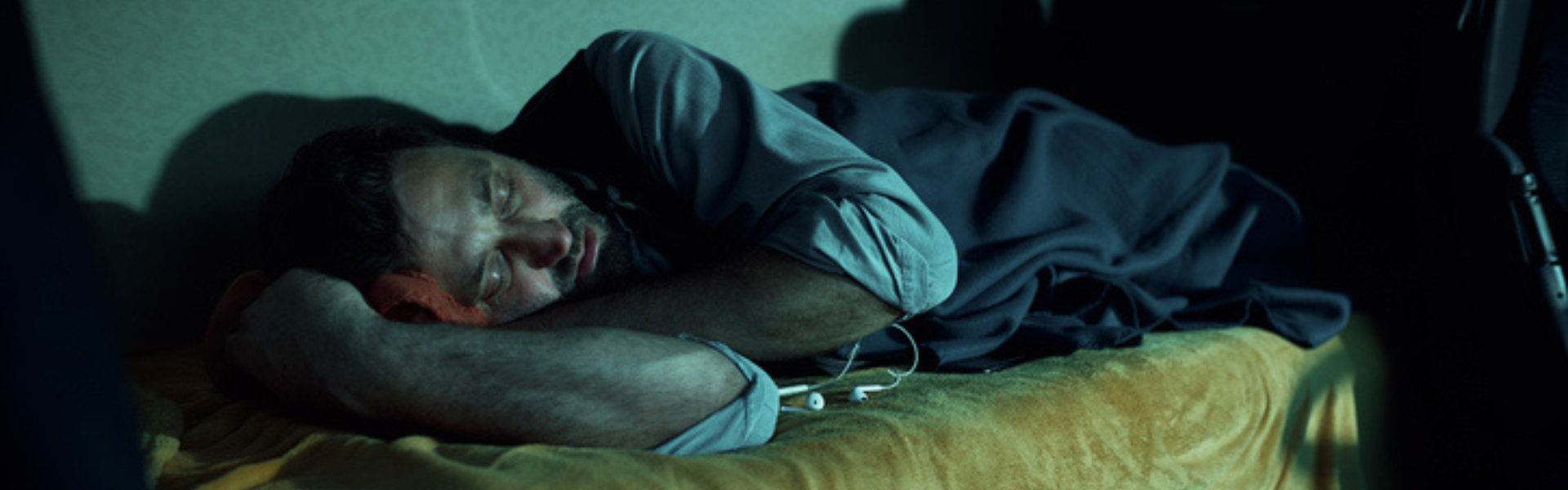 man in sleeper of semi truck