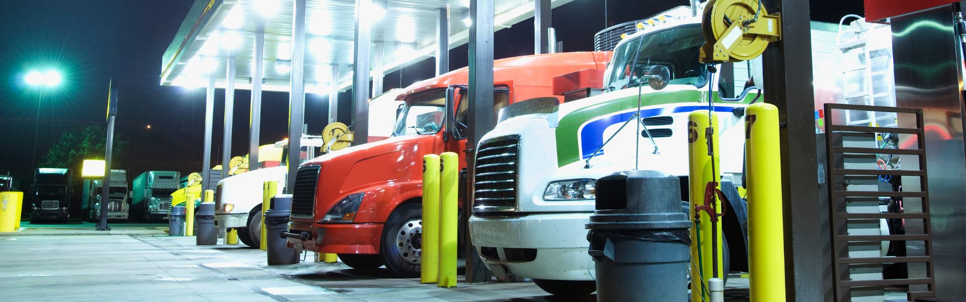 Trucks at fuel island at truck stop