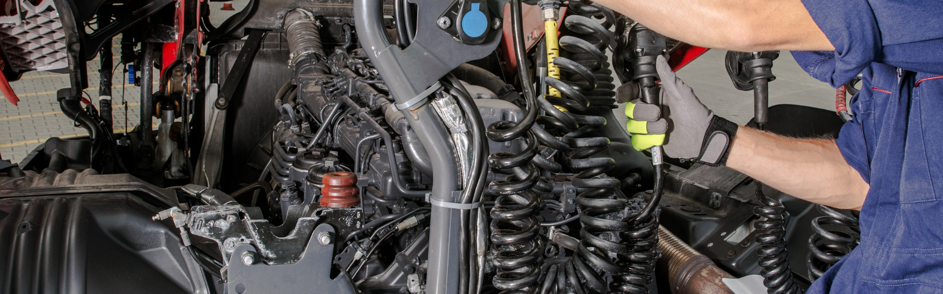 technician working on engine