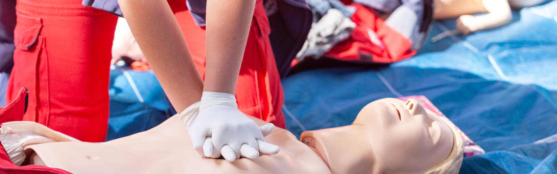 CPR certification training with CPR dummy