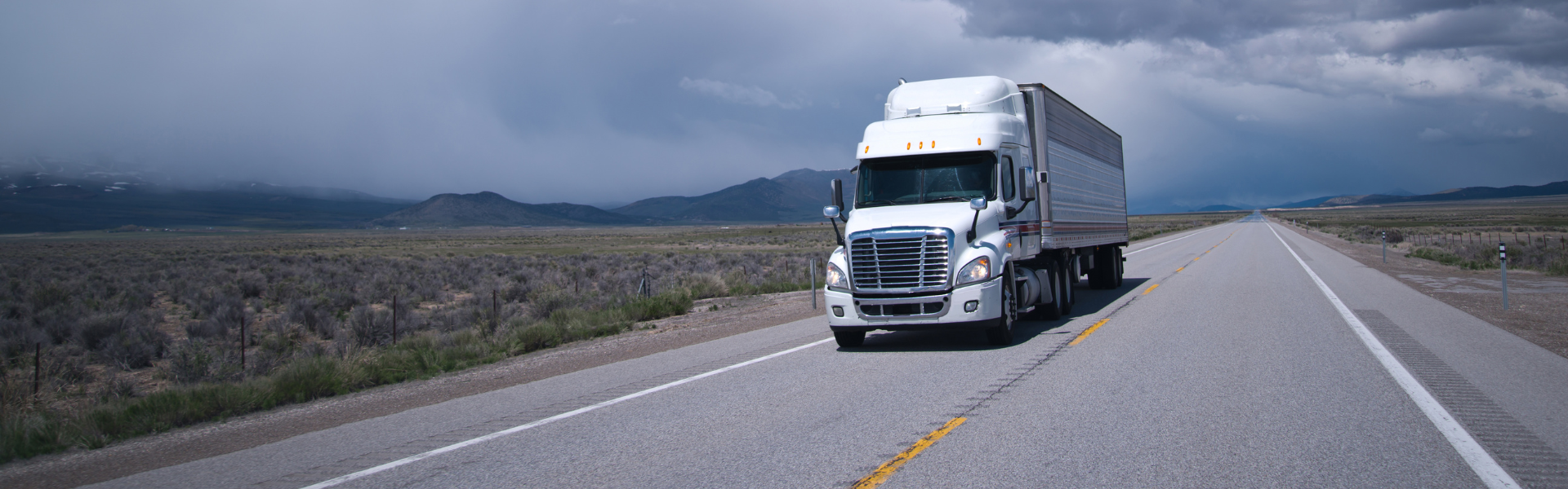 white semi truck on road