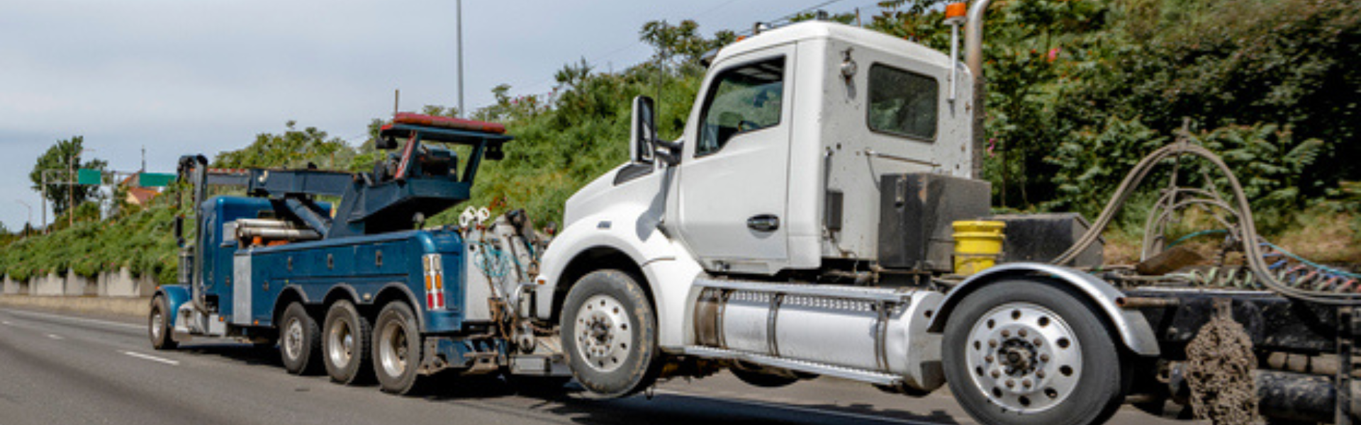 semi truck being towed