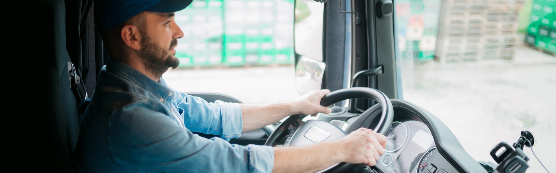 truck driver in semi truck cab