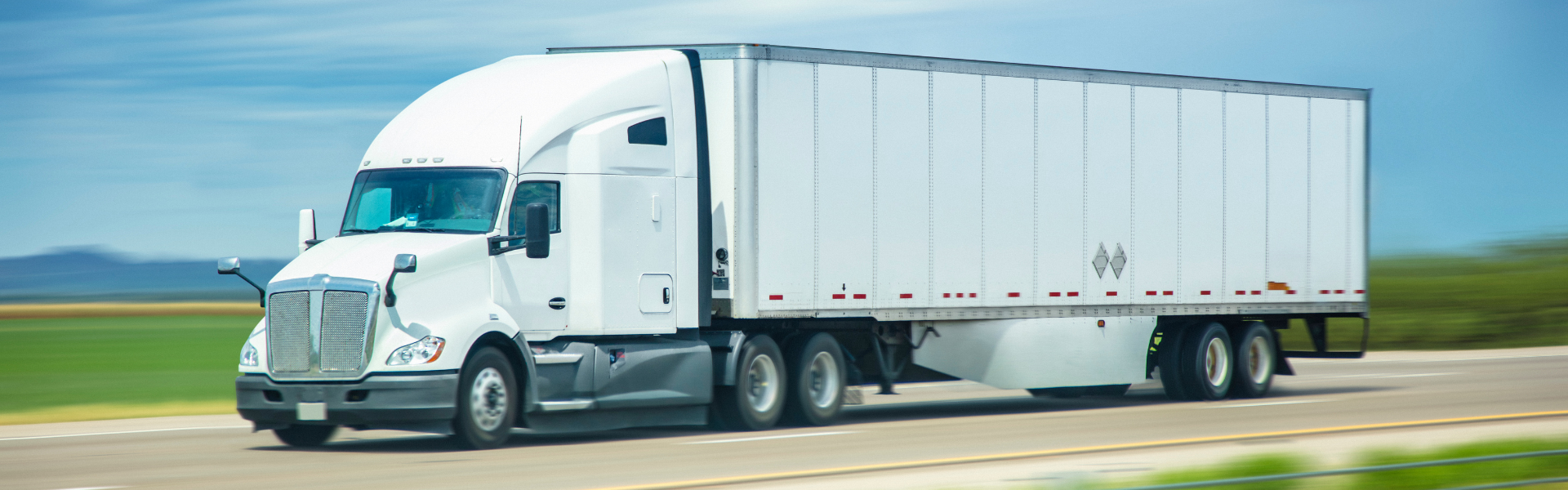 white semi truck with underride guards