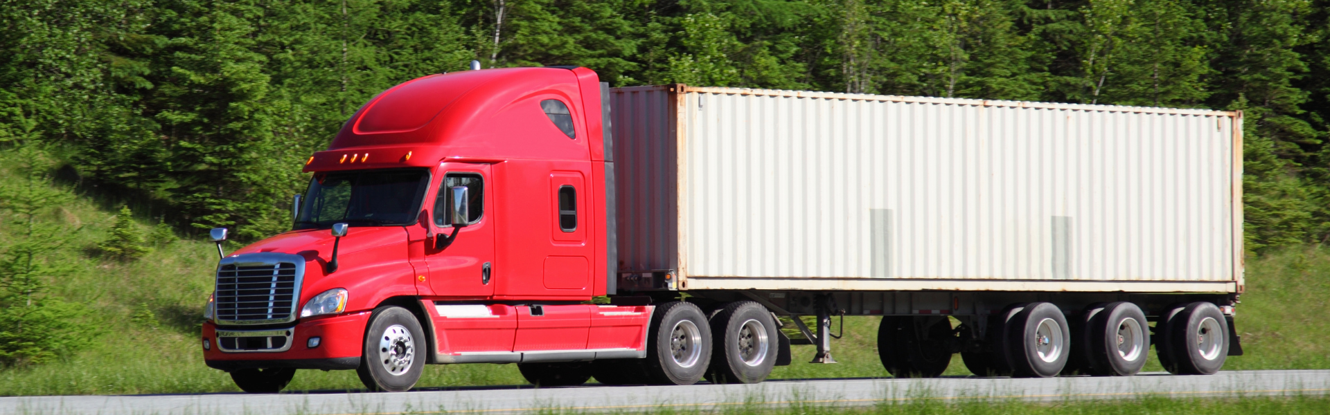red semi truck with white trailer