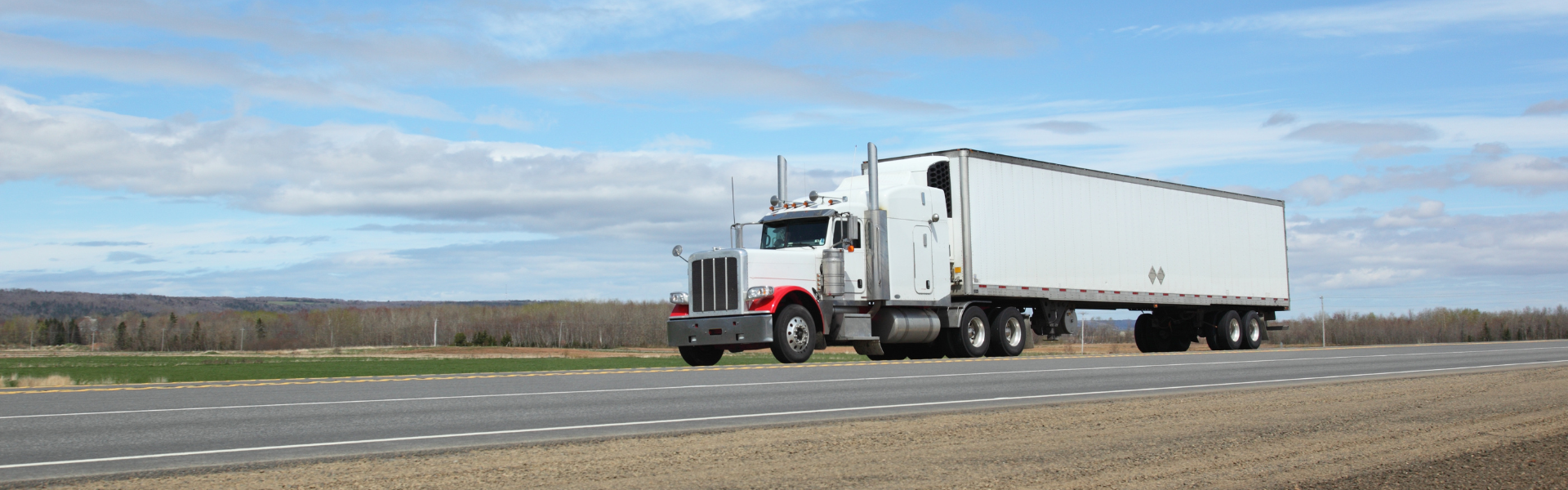 white semi truck on road