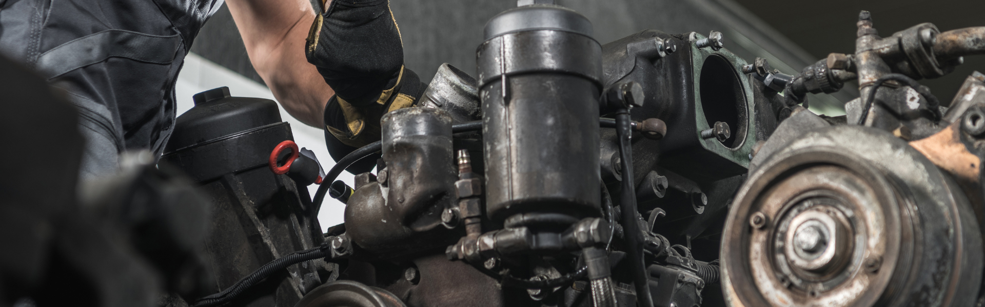 mechanic working on engine