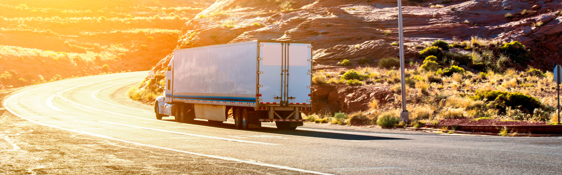 semi on mountainous winding road