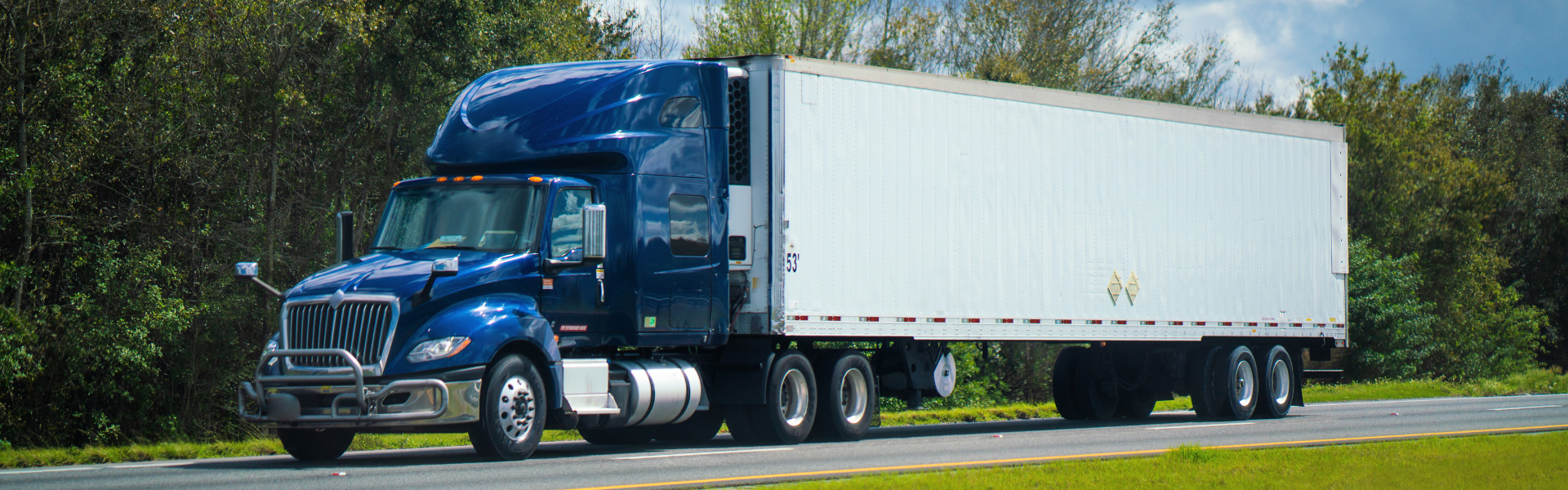 blue semi truck with reefer