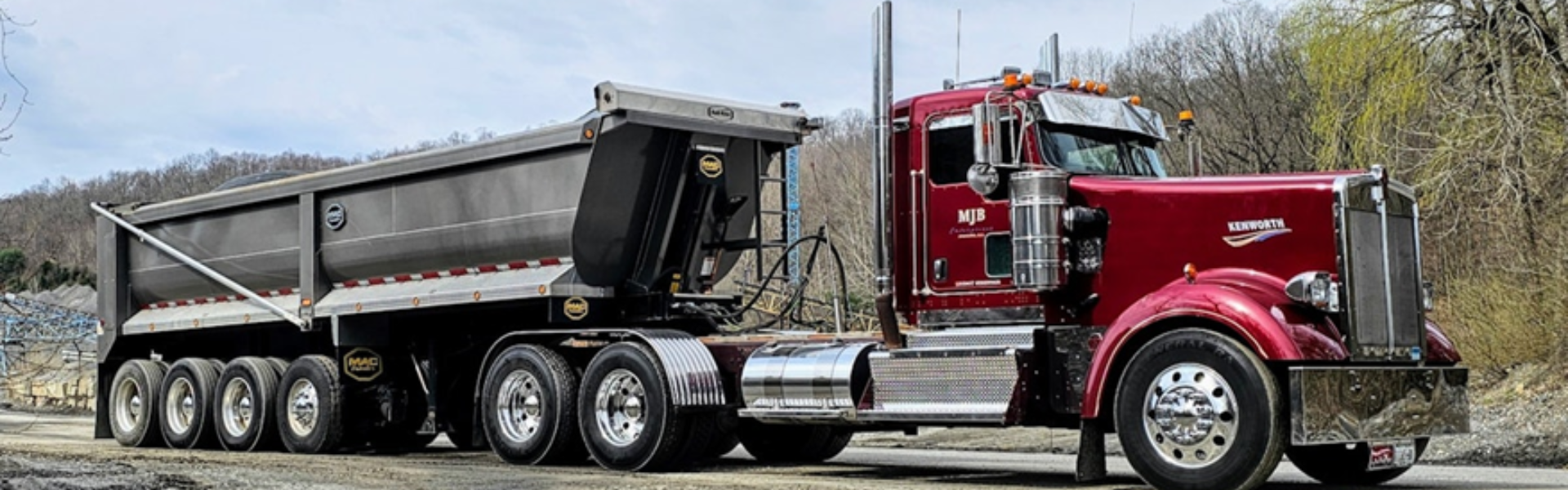 Patrick Tompkins 2012 Kenworth W900 with 2021 Steel Dump Quad